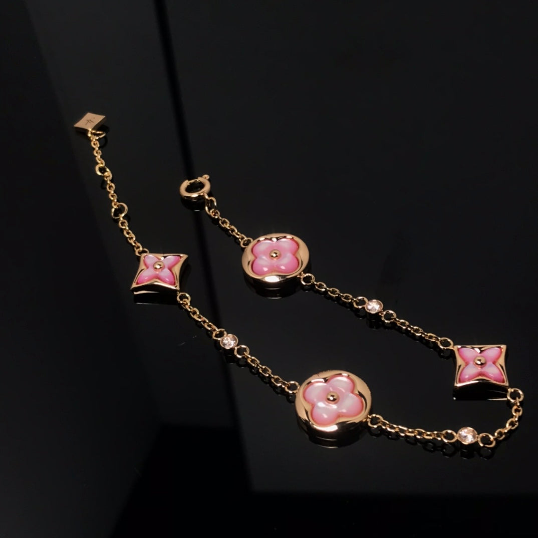 [Regal Jewels]STAR AND SUN 4 MOTIF PINK MOP PINK GOLD BRACELET