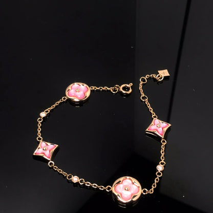 [Regal Jewels]STAR AND SUN 4 MOTIF PINK MOP PINK GOLD BRACELET