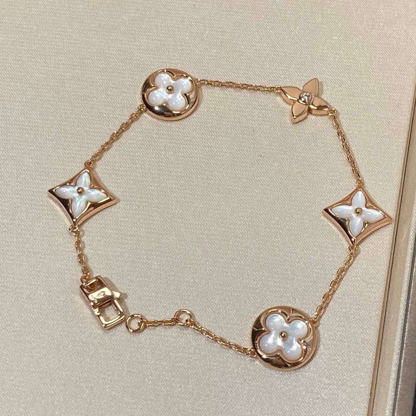 [Regal Jewels]STAR AND SUN 5 MOTIF MOP PINK GOLD BRACELET