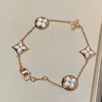 [Regal Jewels]STAR AND SUN 5 MOTIF MOP PINK GOLD BRACELET