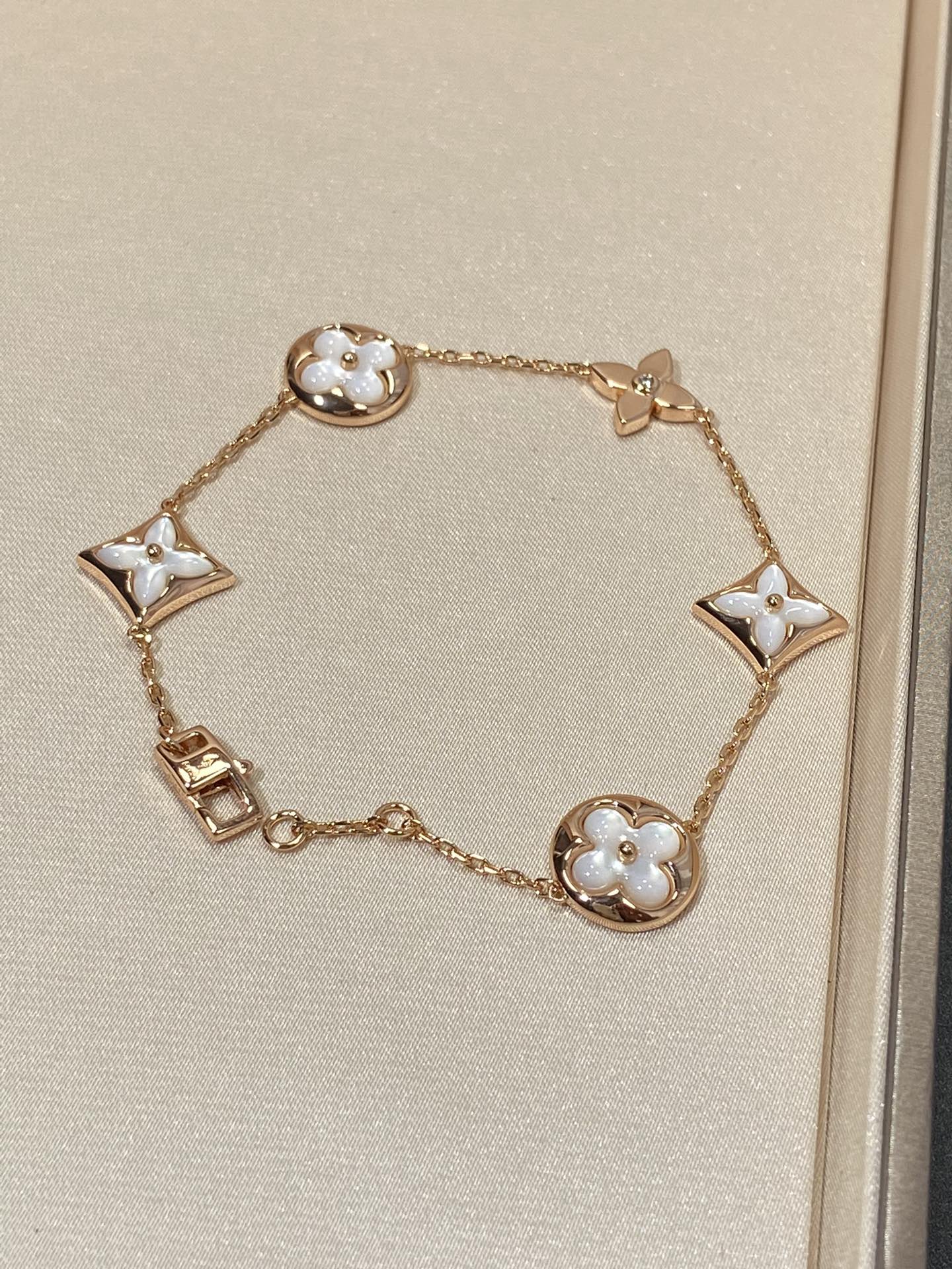 [Regal Jewels]STAR AND SUN 5 MOTIF MOP PINK GOLD BRACELET