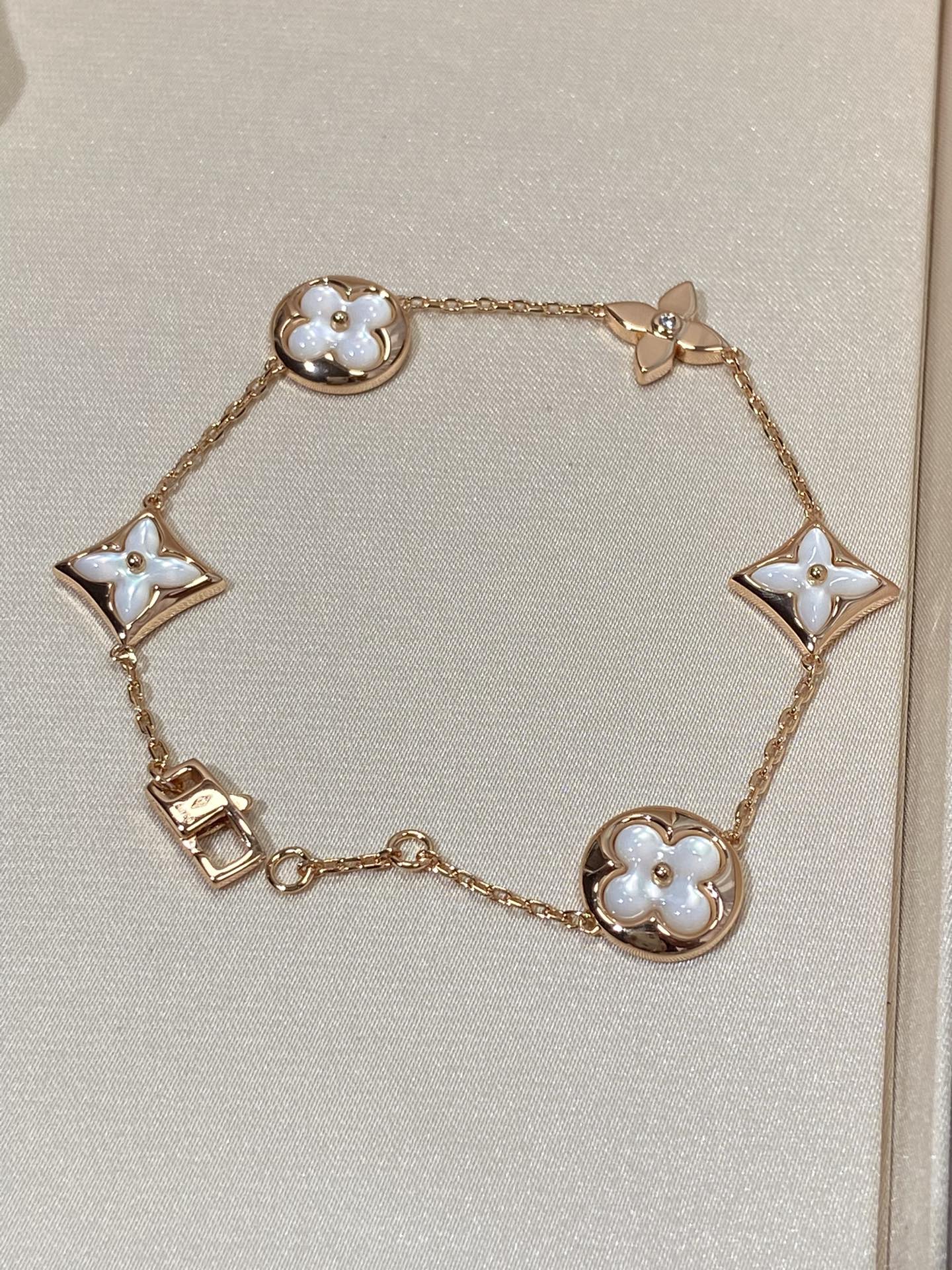 [Regal Jewels]STAR AND SUN 5 MOTIF MOP PINK GOLD BRACELET