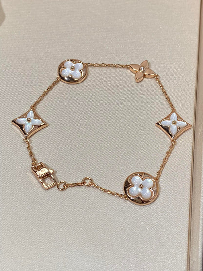 [Regal Jewels]STAR AND SUN 5 MOTIF MOP PINK GOLD BRACELET