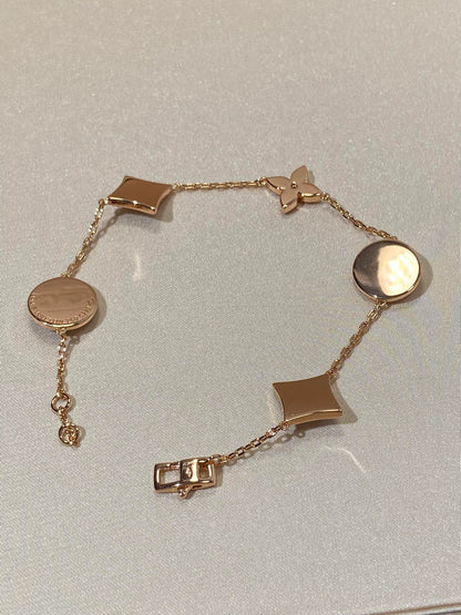 [Regal Jewels]STAR AND SUN 5 MOTIF MOP PINK GOLD BRACELET