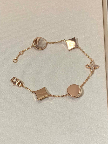 [Regal Jewels]STAR AND SUN 5 MOTIF MOP PINK GOLD BRACELET