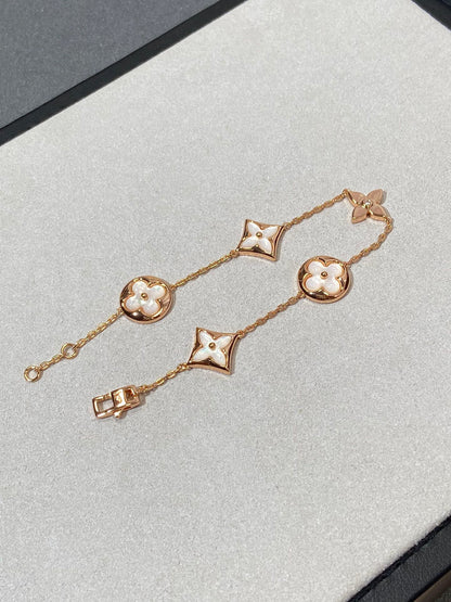 [Regal Jewels]STAR AND SUN 5 MOTIF MOP PINK GOLD BRACELET