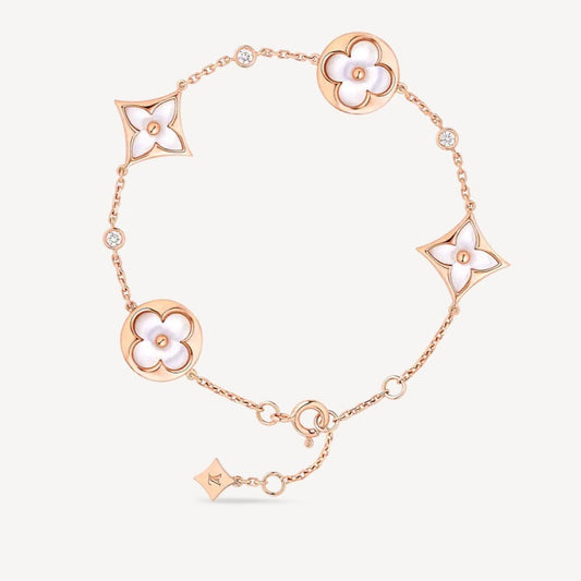 [Regal Jewels]STAR AND SUN 4 MOTIF WHITE MOP PINK GOLD BRACELET