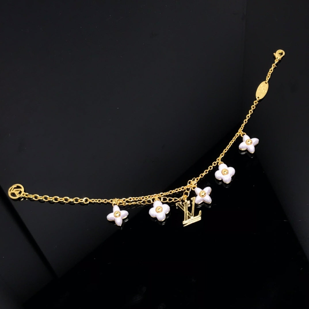[Regal Jewels]LOGO 6 MOTIF STAR AND SUN GOLD BRACELET