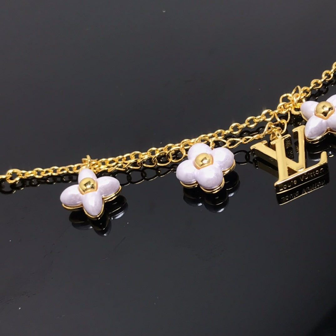 [Regal Jewels]LOGO 6 MOTIF STAR AND SUN GOLD BRACELET