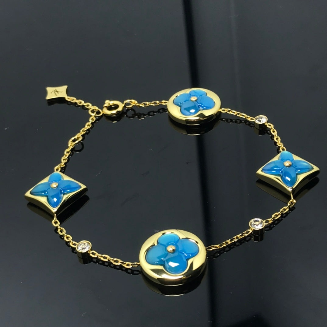 [Regal Jewels]STAR AND SUN 4 MOTIF BLUE BRACELET